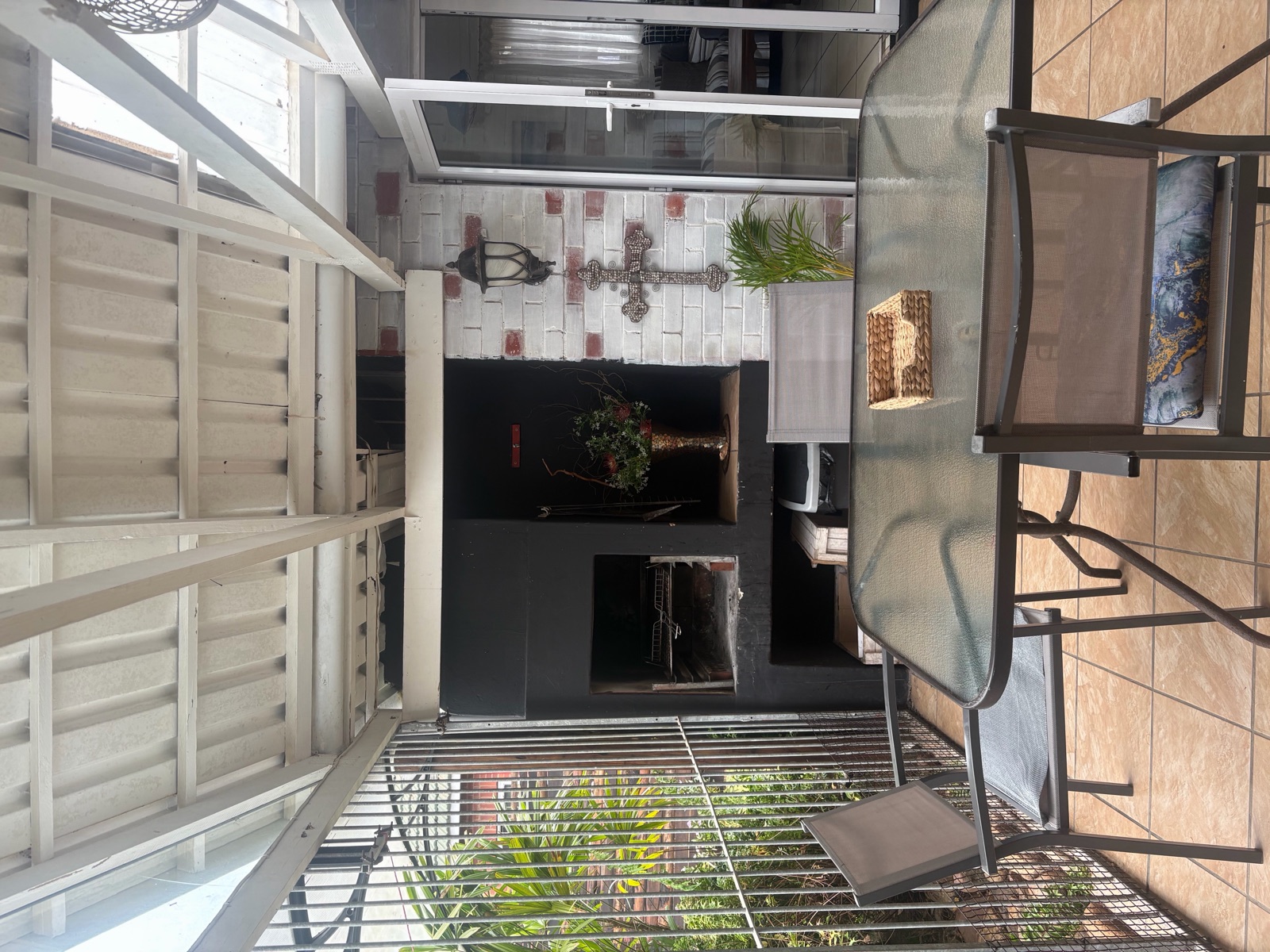 Patio dining table beside the braai